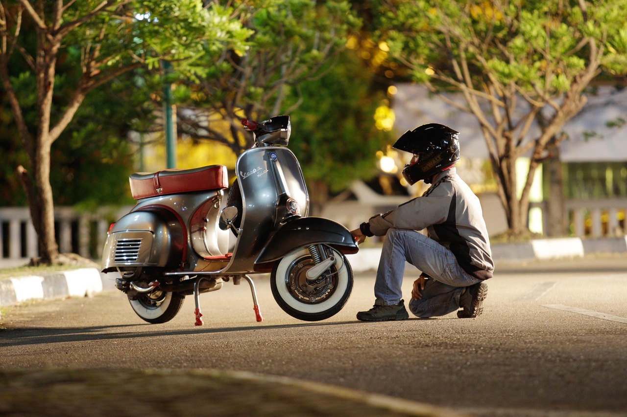 A motorcyclist in full protective gear confidently rides along an open Montana road, symbolizing the importance of safety and training promoted by the Montana Motorcycle Safety Foundation.