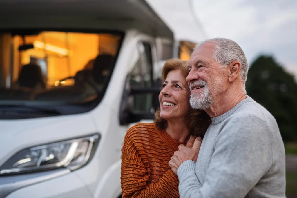 A relaxed couple enjoys their RV knowing their LLC was renewed on time, delivering peace of mind and uninterrupted freedom on the road.
