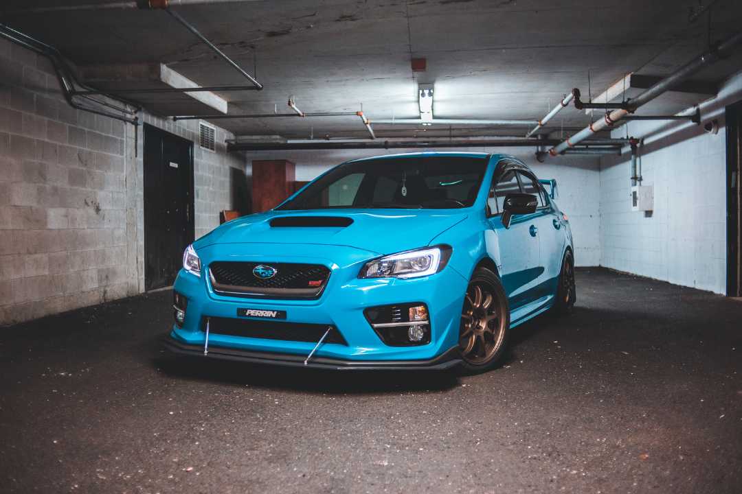 Bright blue performance car in basement parking, perfectly maintained and ready for official car title transfer Illinois paperwork. Bright blue performance car in basement parking, perfectly maintained and ready for official car title transfer Illinois paperwork.