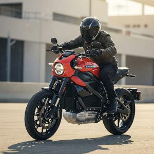 Rider on red electric motorcycle in urban parking garage demonstrating modern eco-friendly transportation technology