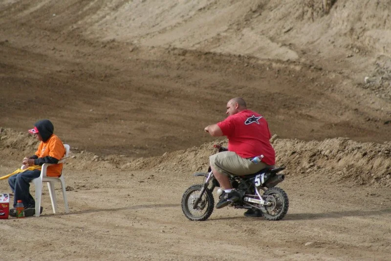 fat guy on dirt bike