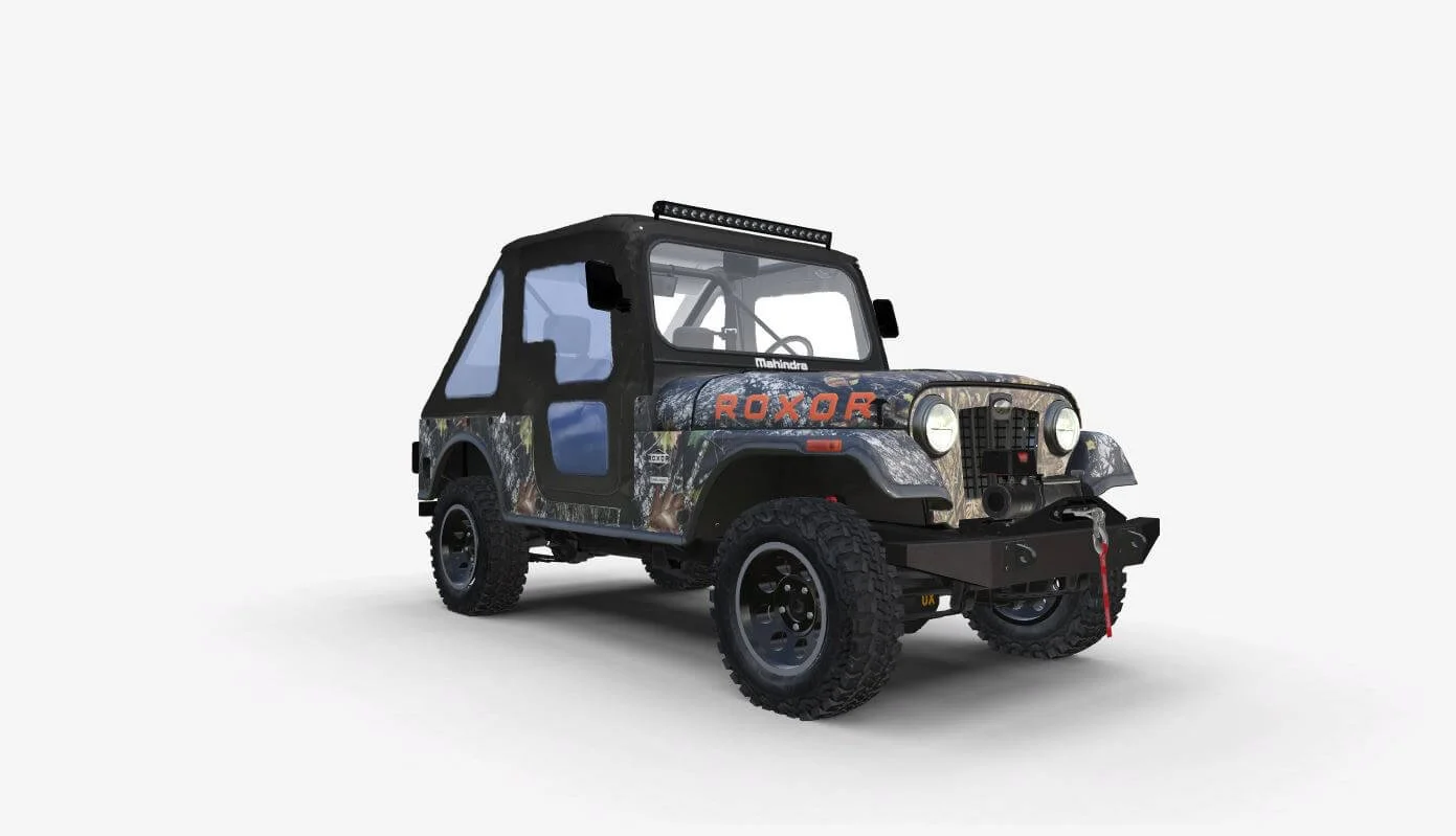 Custom 2019 Mahindra Roxor UTV with camouflage wrap and bespoke modifications displayed against white background.
