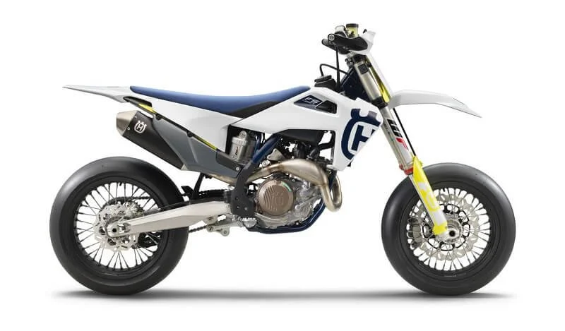 White and blue 2020 Husqvarna FS 450 Supermoto dirt bike displayed in profile view with modern updates.
