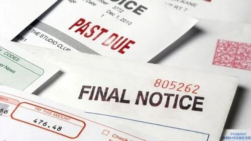 Collection notices and past due bills showing vehicle repossession debt and final payment demands from creditors