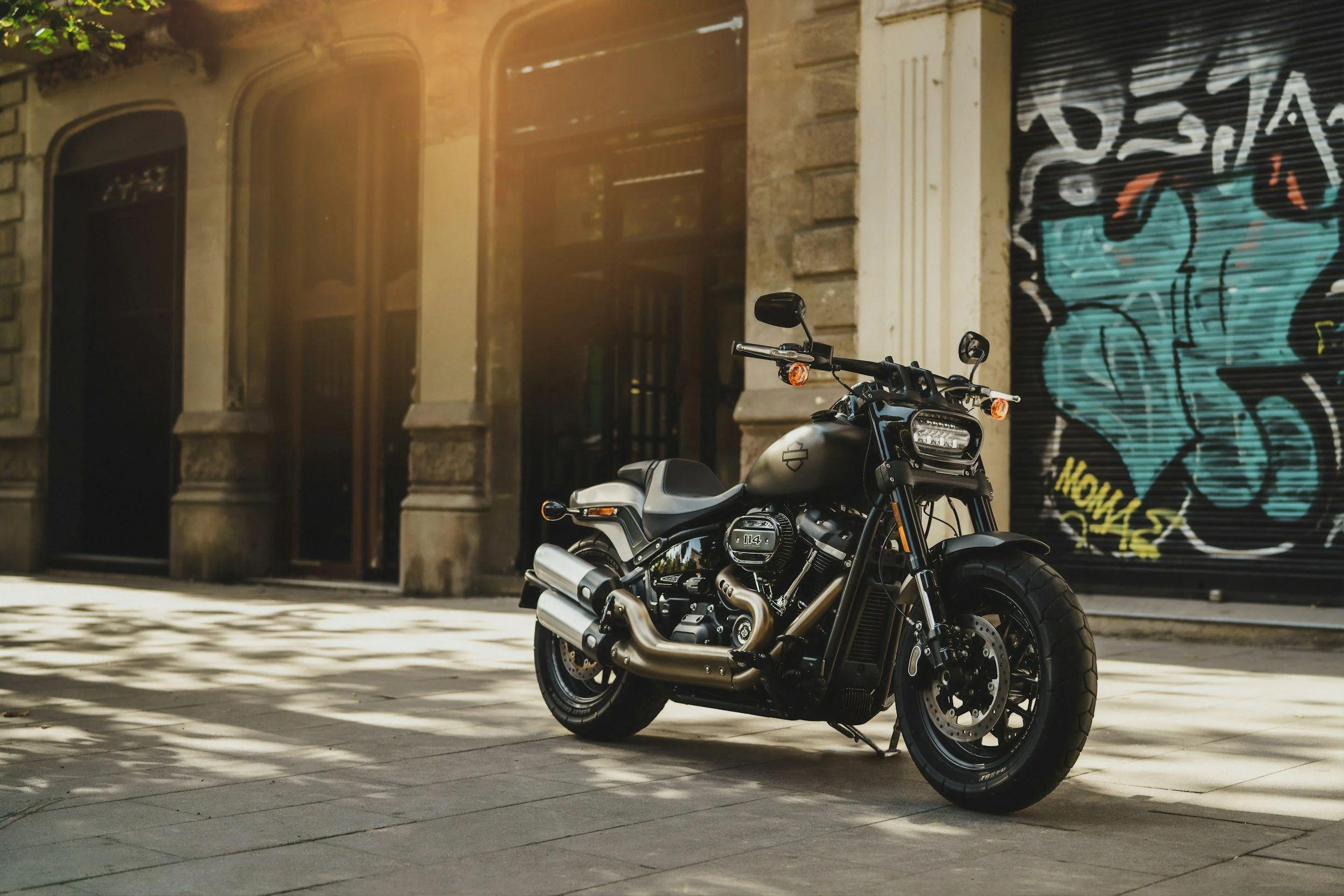 Cruiser motorcycle parked on urban street, promoting Effortless holiday motorcycle registration and DMV convenience.