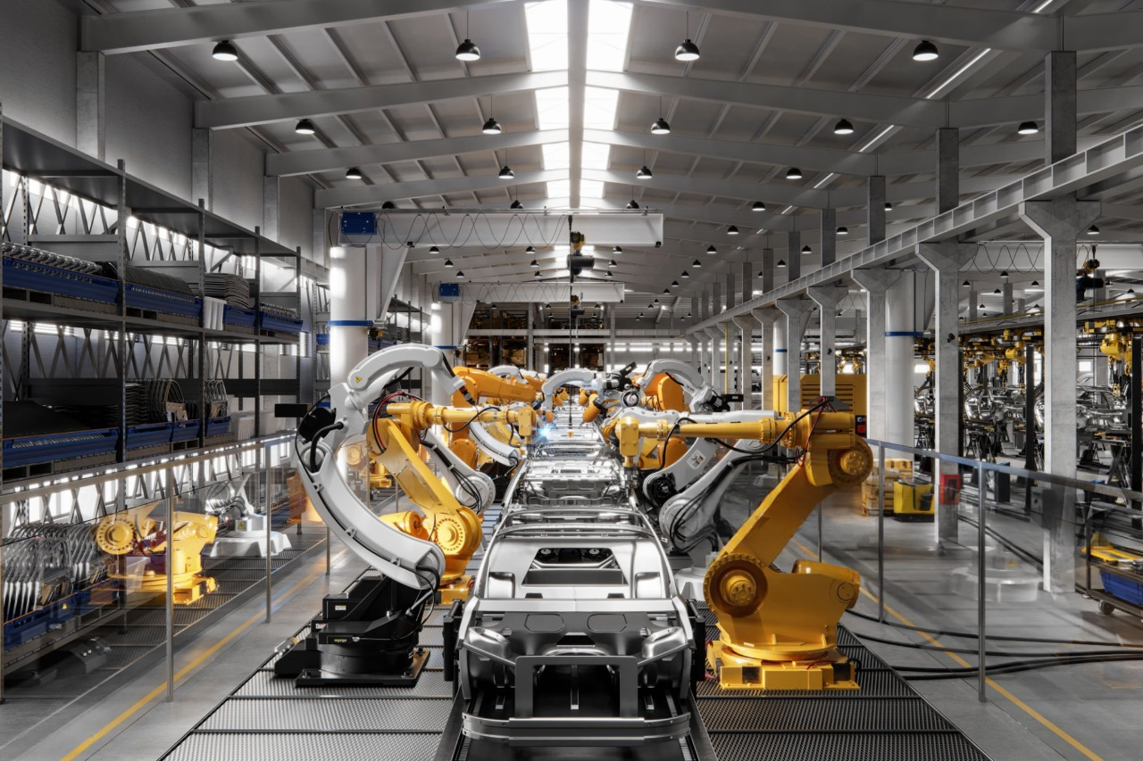 Automated car manufacturing assembly line with robotic arms assembling vehicle bodies