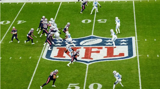 NFL football game in progress with players on field, perfect tailgating viewing experience for Super Bowl 2025