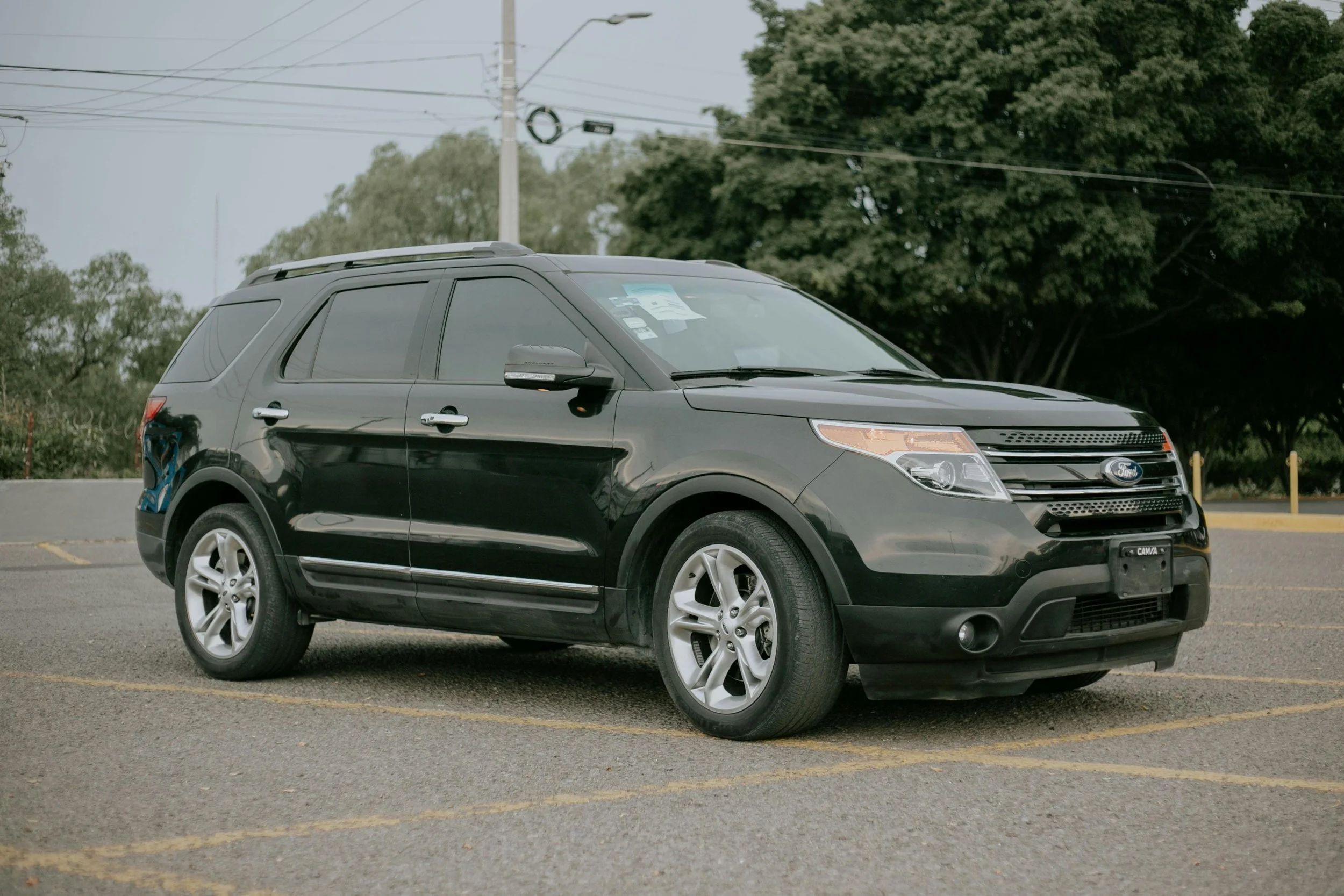 Black Ford Explorer SUV parked outdoors, subject of major vehicle safety recall affecting thousands of U.S. models