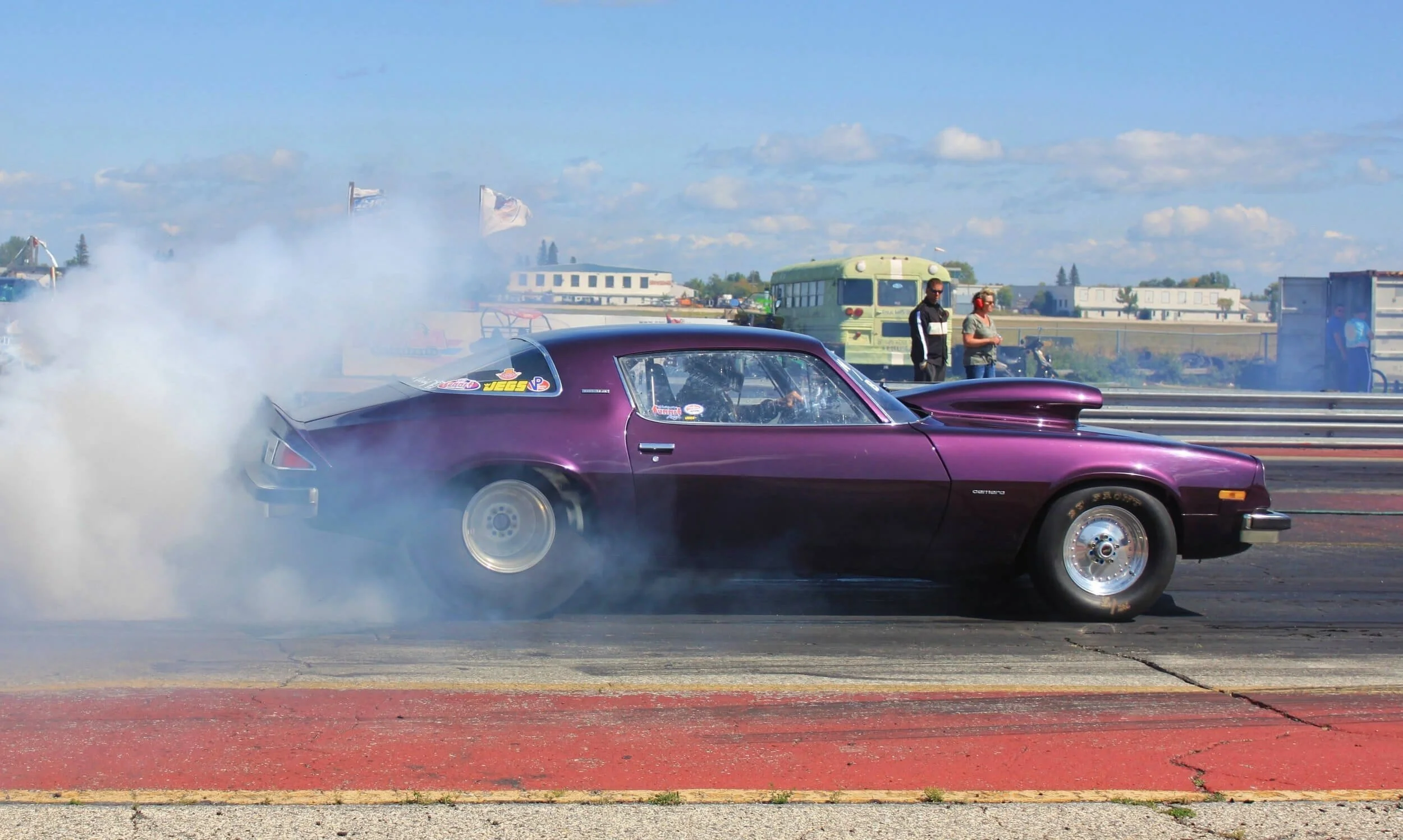purple car burning out