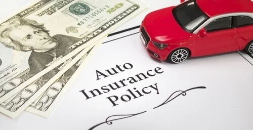 car cash with text auto insurance policy