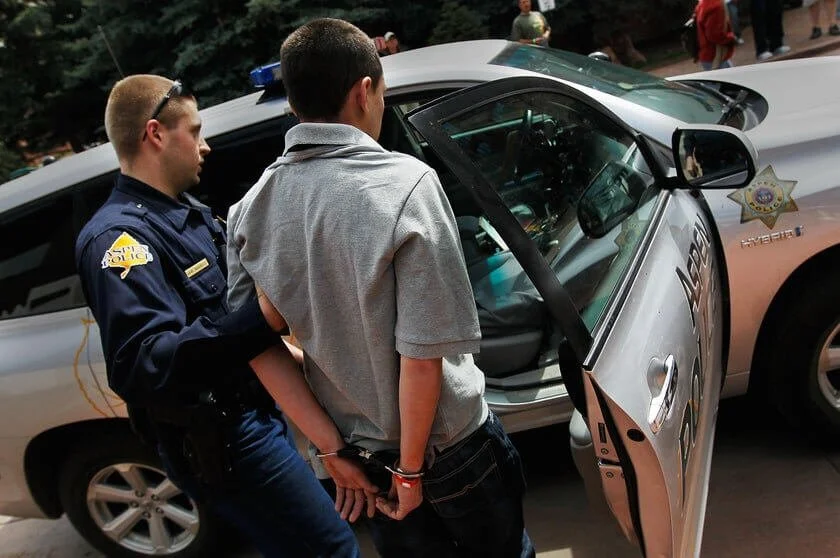 police arresting man