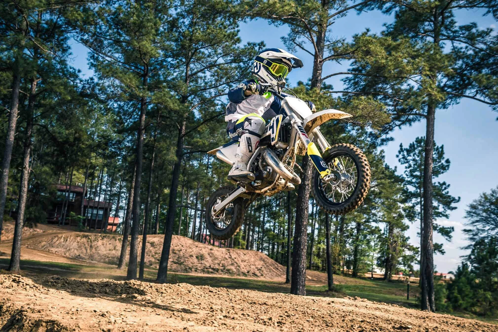Husqvarna TC50a jumping in the air