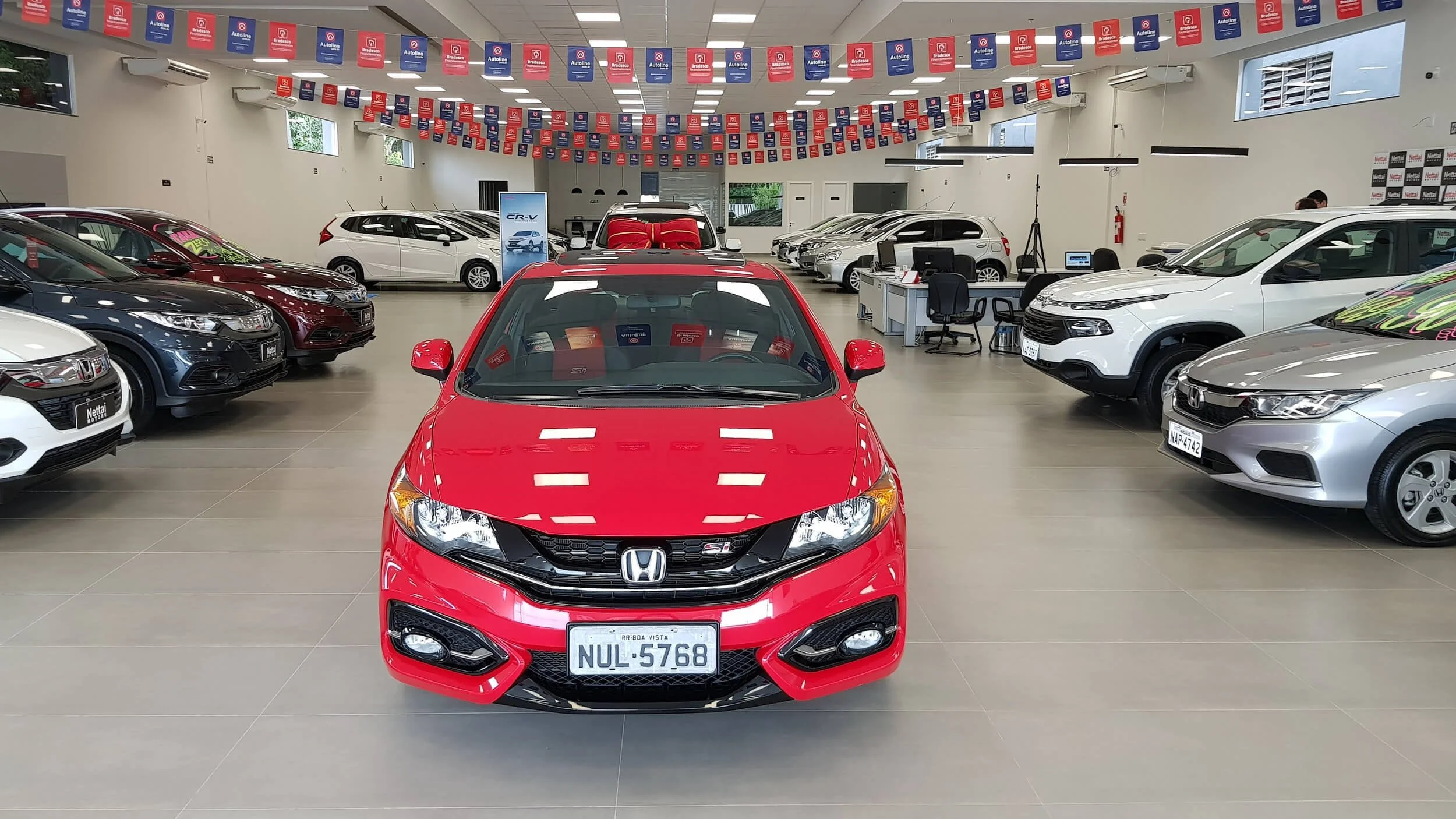 Red honda civic sedan