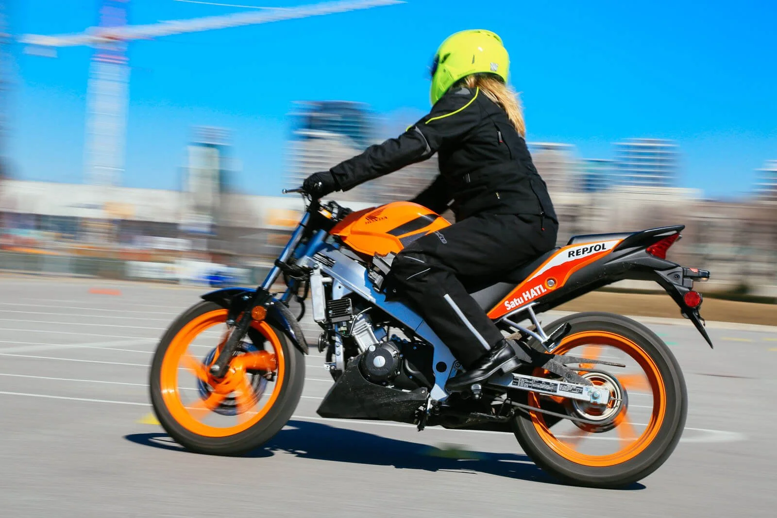 Repsol motorcycle rider on street