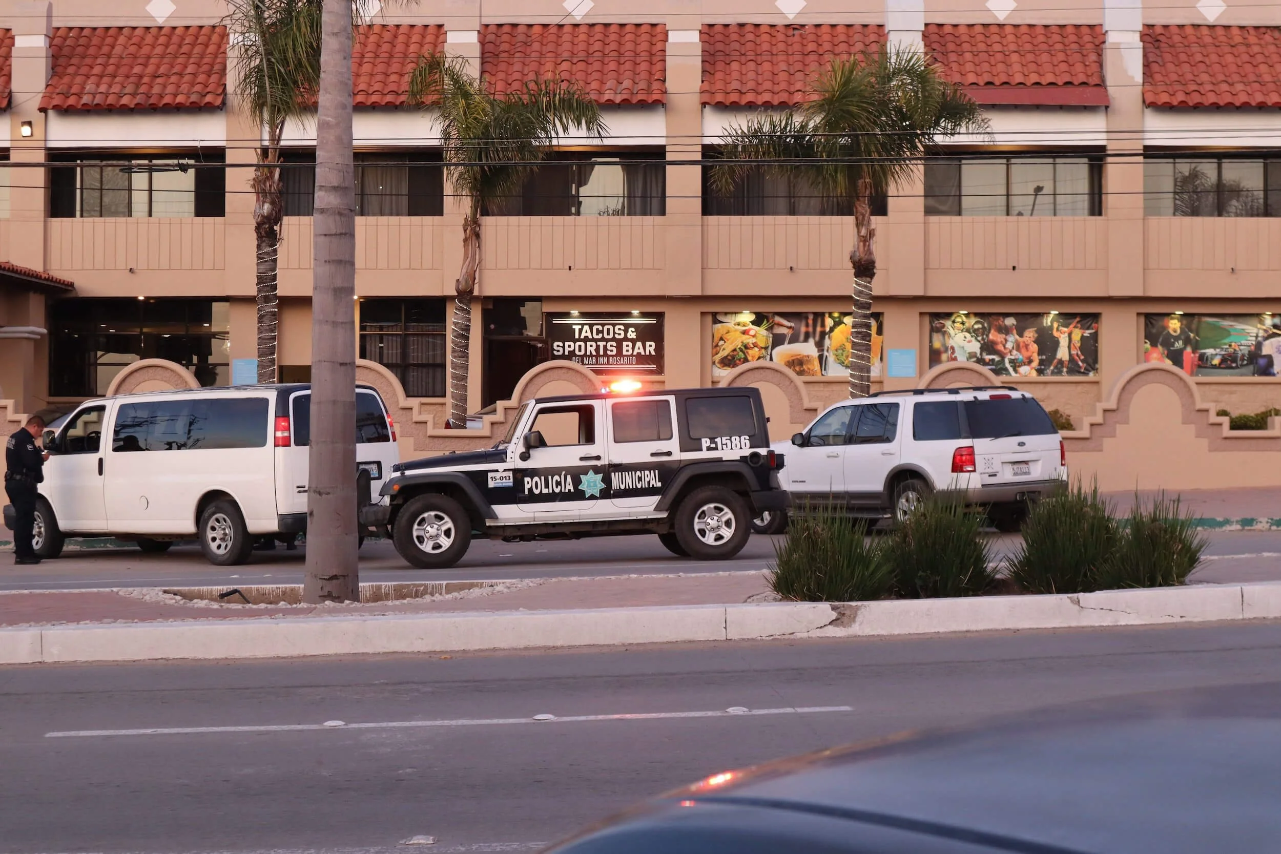 police cars parked outside building in Mexico