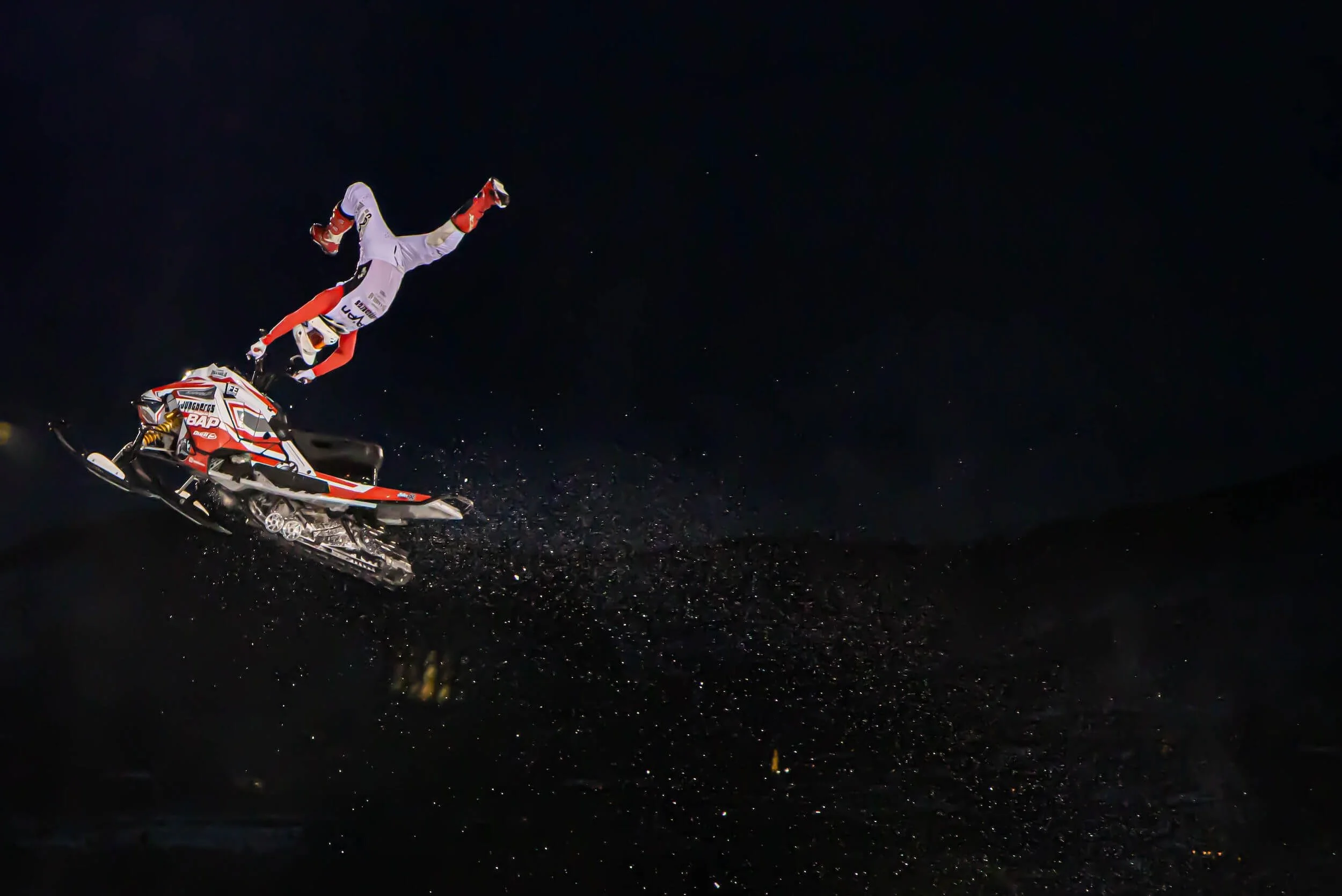 snowmobile jumping in the air