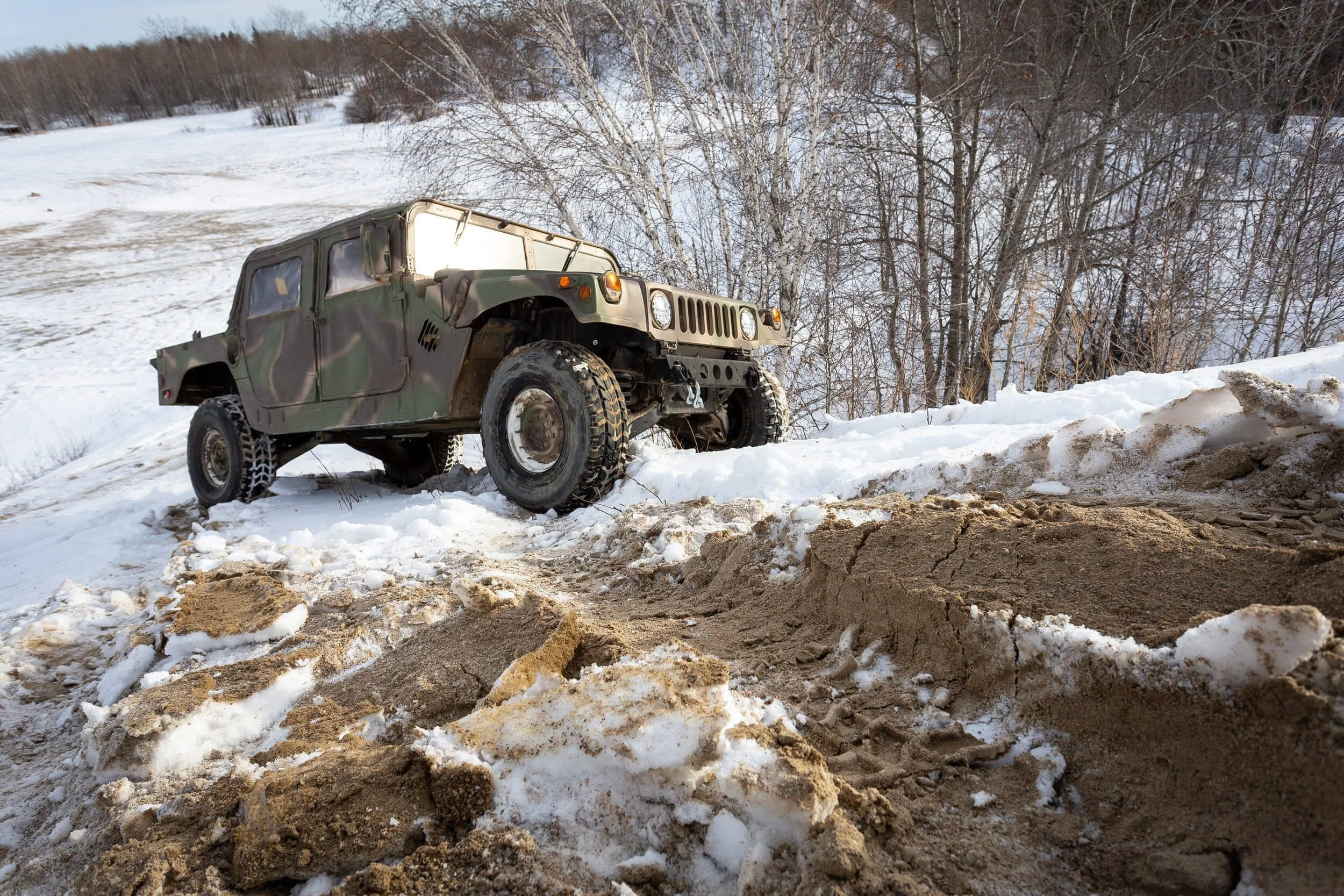 Humvee on snow covered area