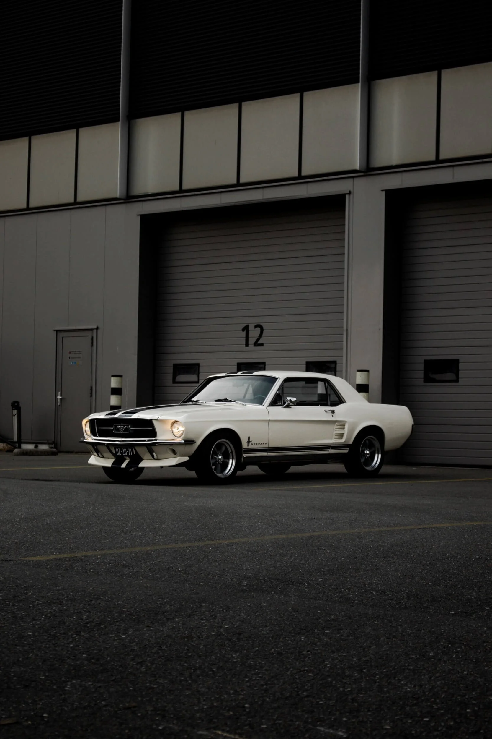 white chevrolet camaro parked