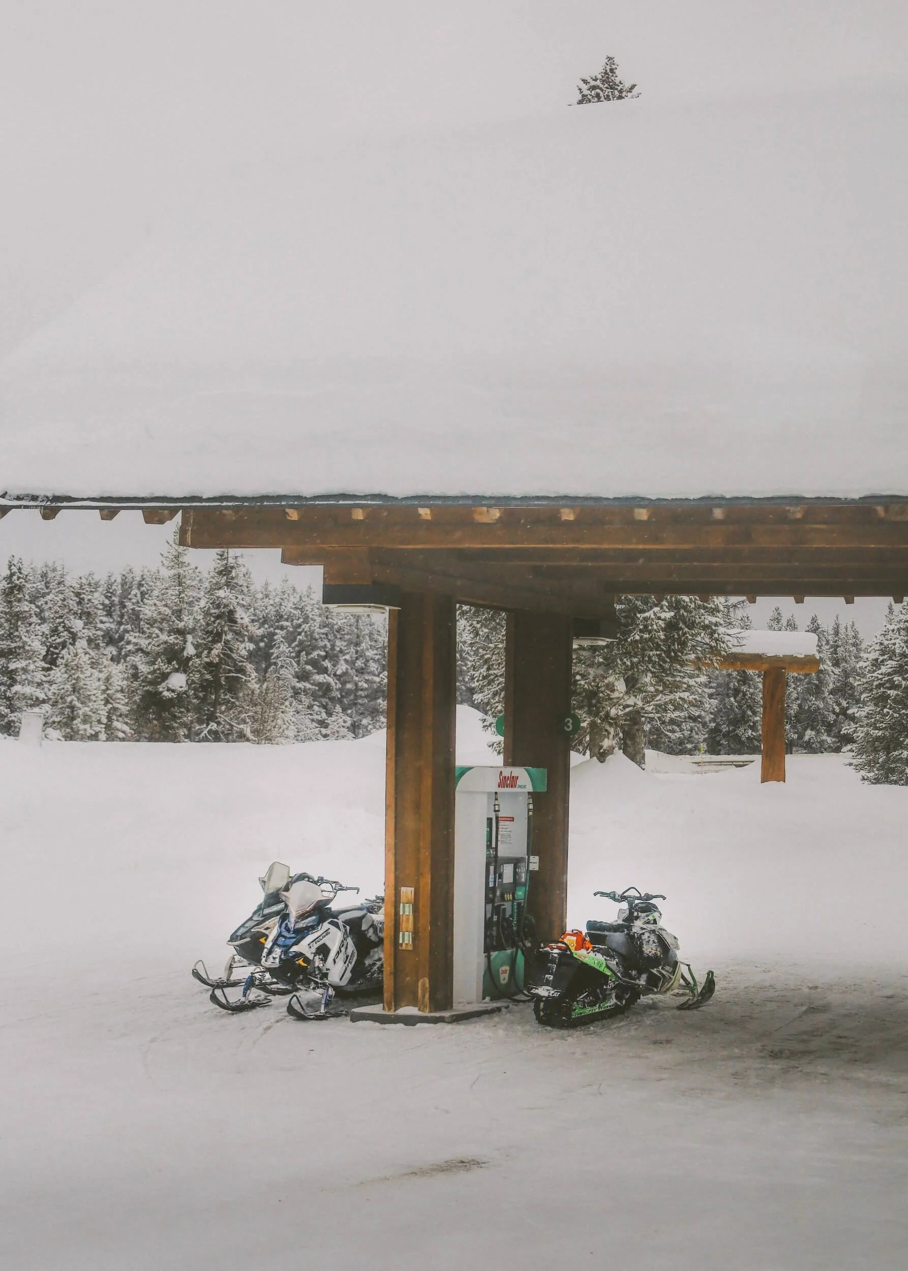 snowmobiles at gas station
