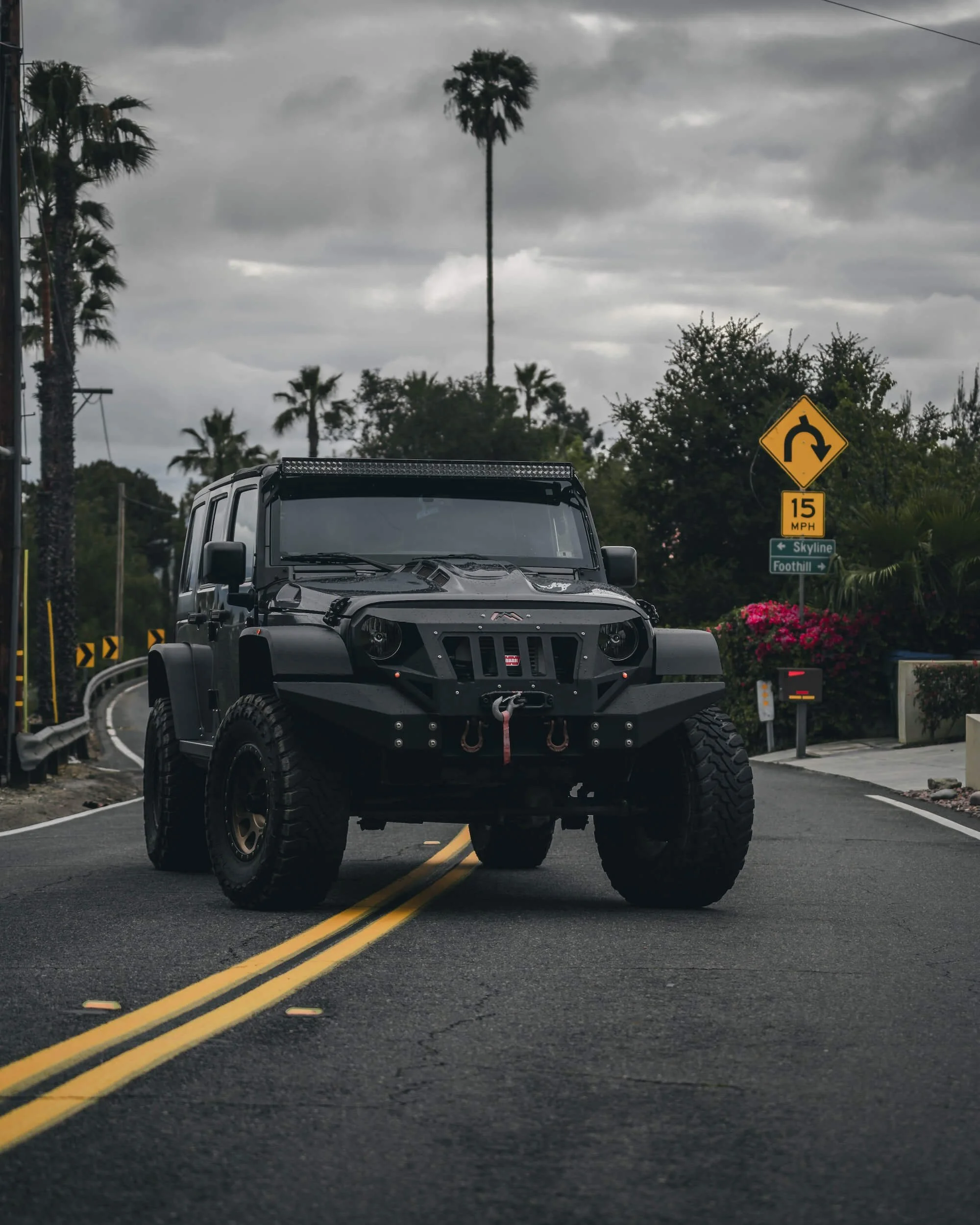 black jeep wrangler on road