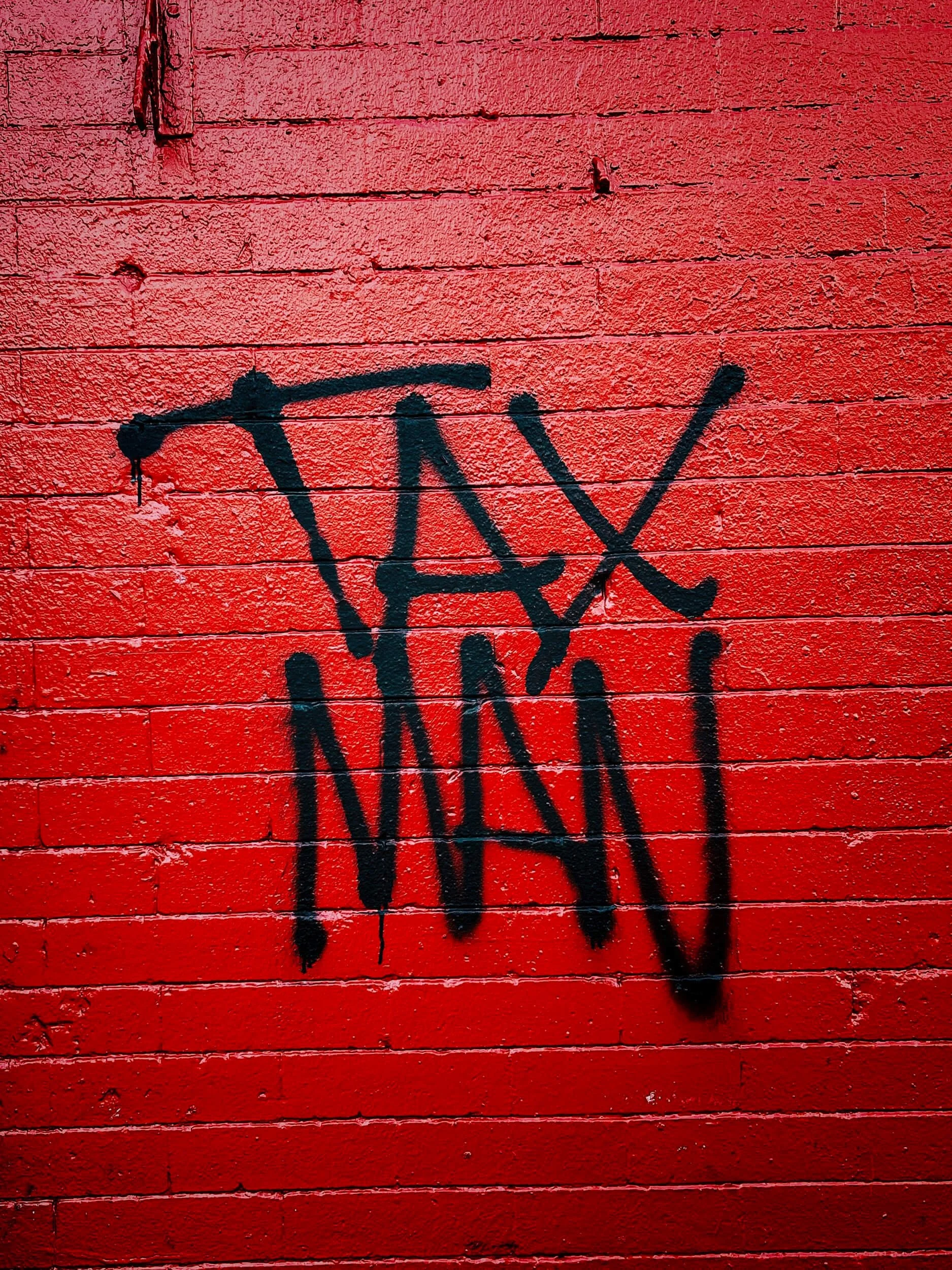tax man written on wall