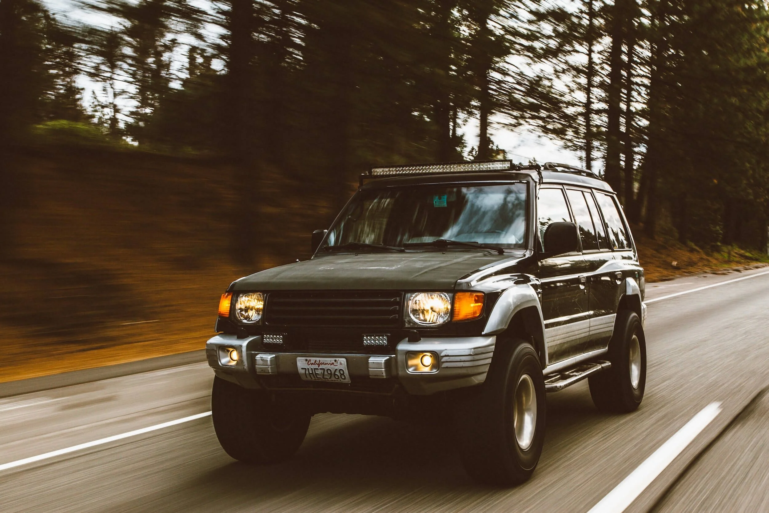green suv on street