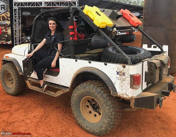 woman sitting on a dirty roxor