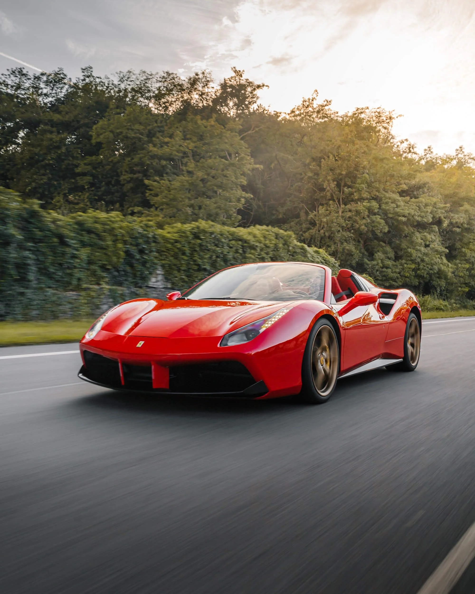 red ferrari on street