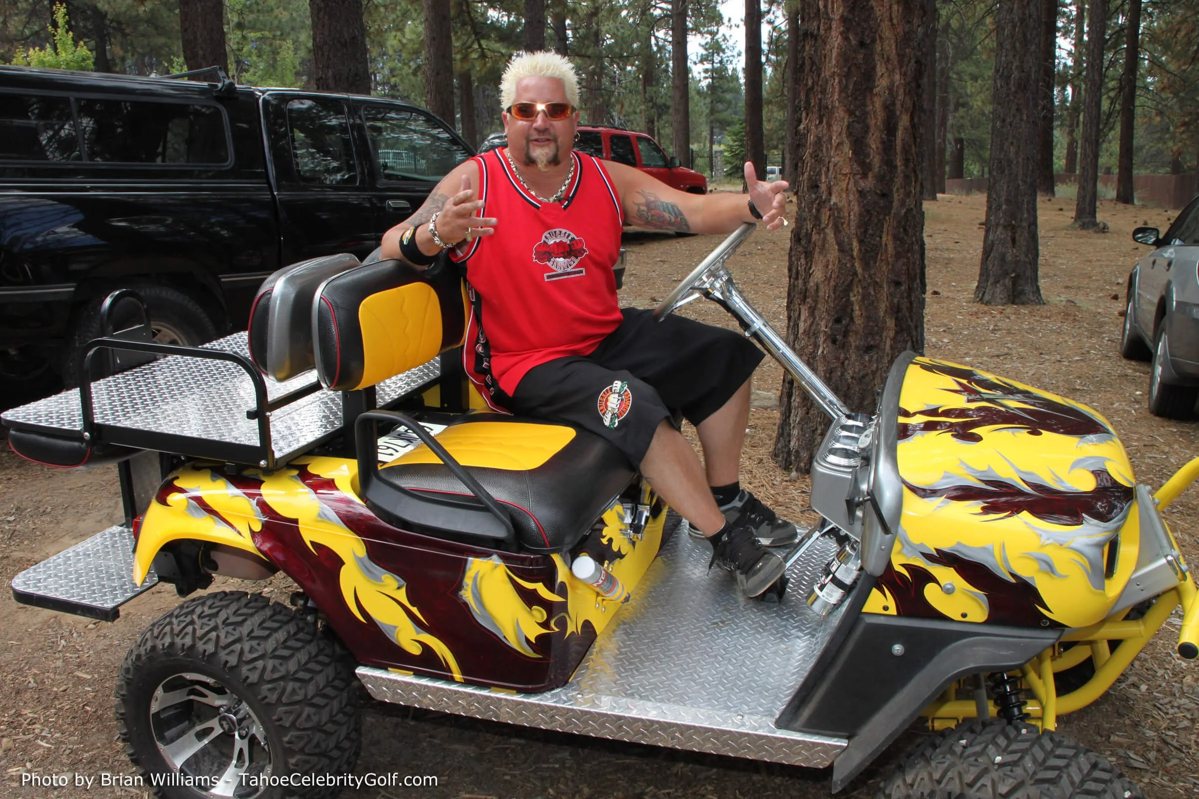 guy fiery on modified golf cart