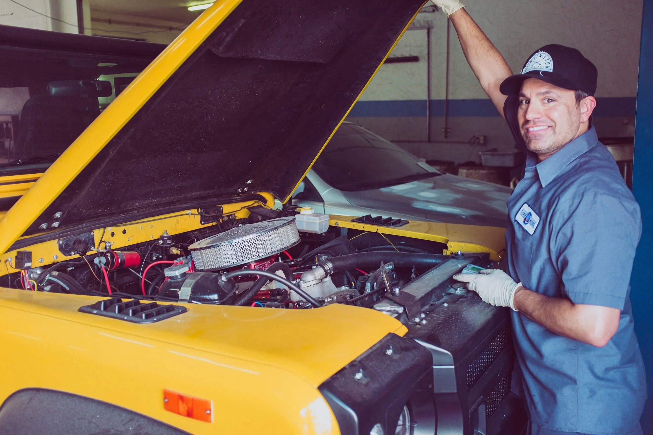 mechanic inspecting a car