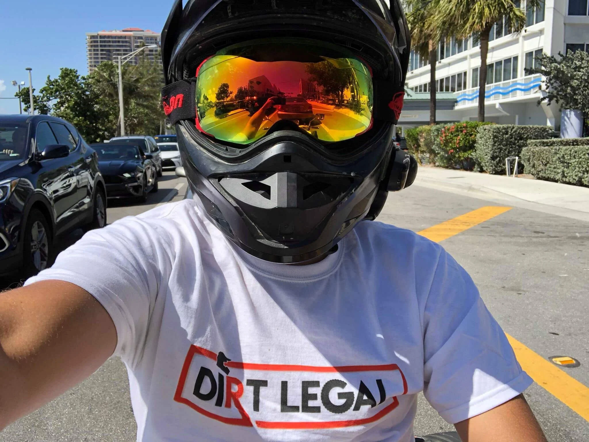 man wearing dirt legal shirt and helmet
