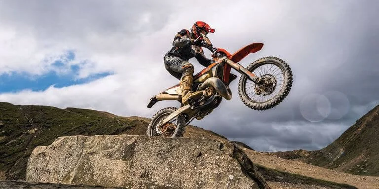 dirt bike jumping in the air