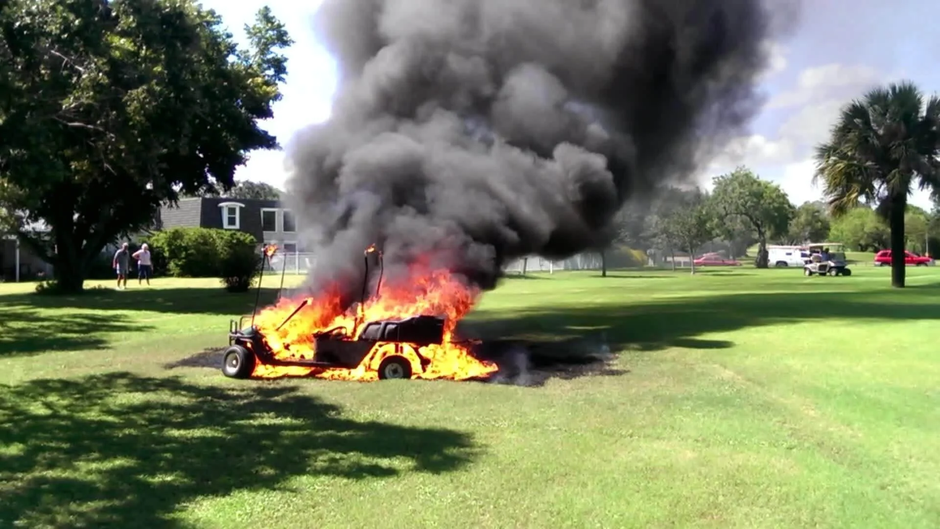 golf cart on fire