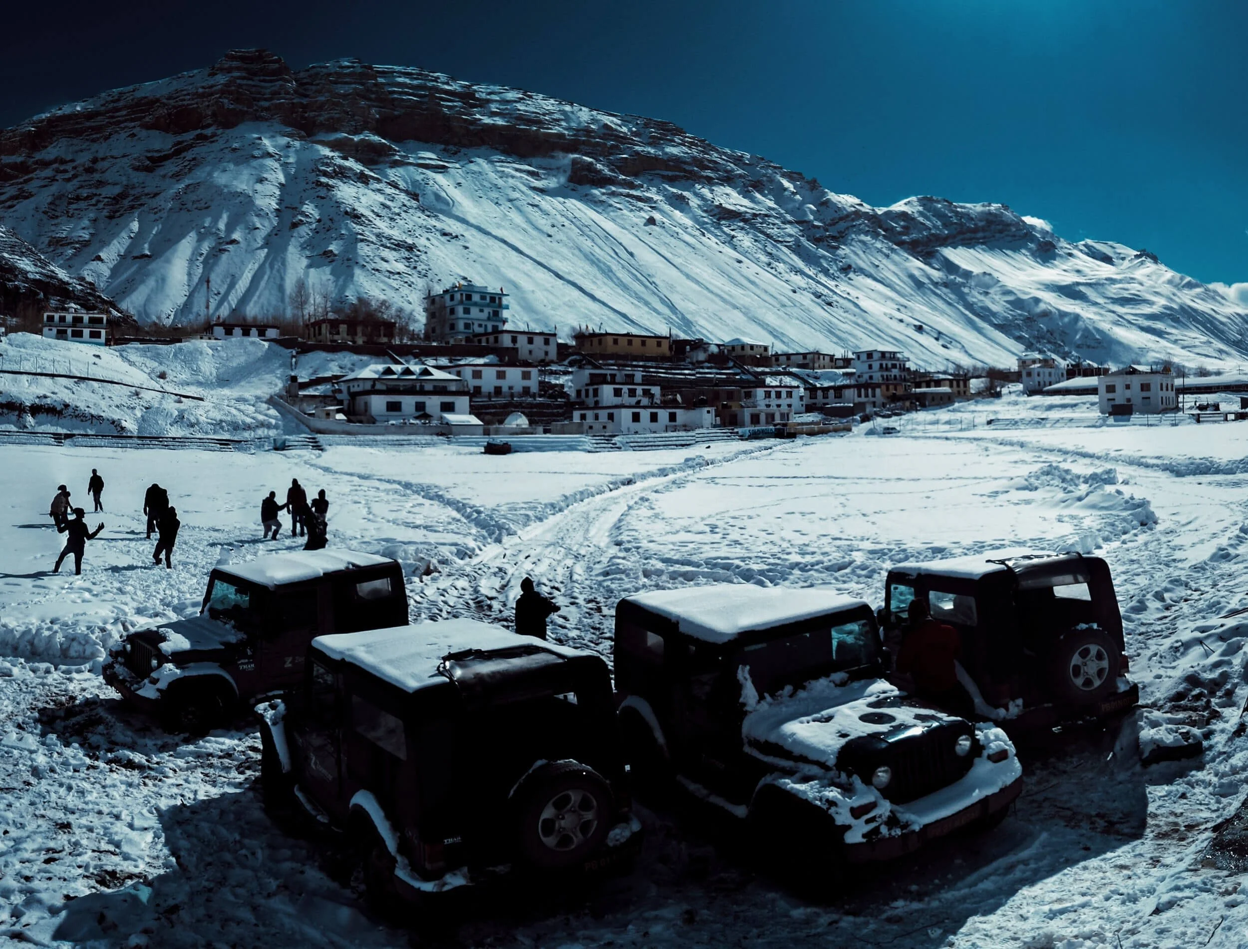 mahindra roxors on snow covered ground in a villa