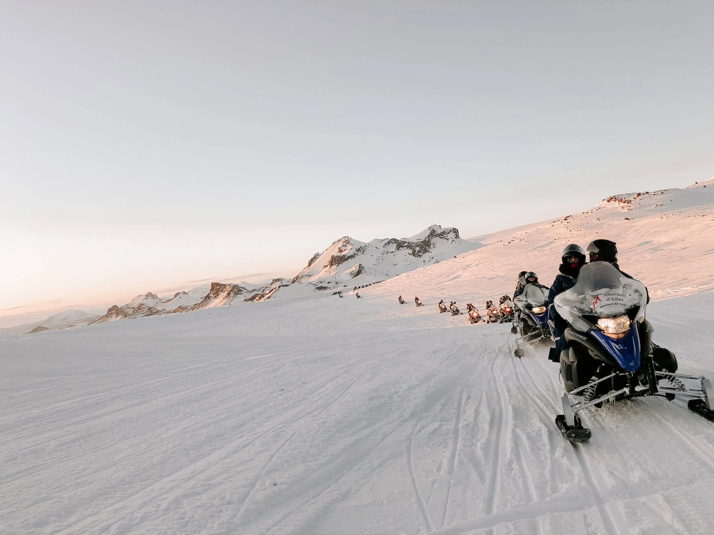 line of snowmobiles