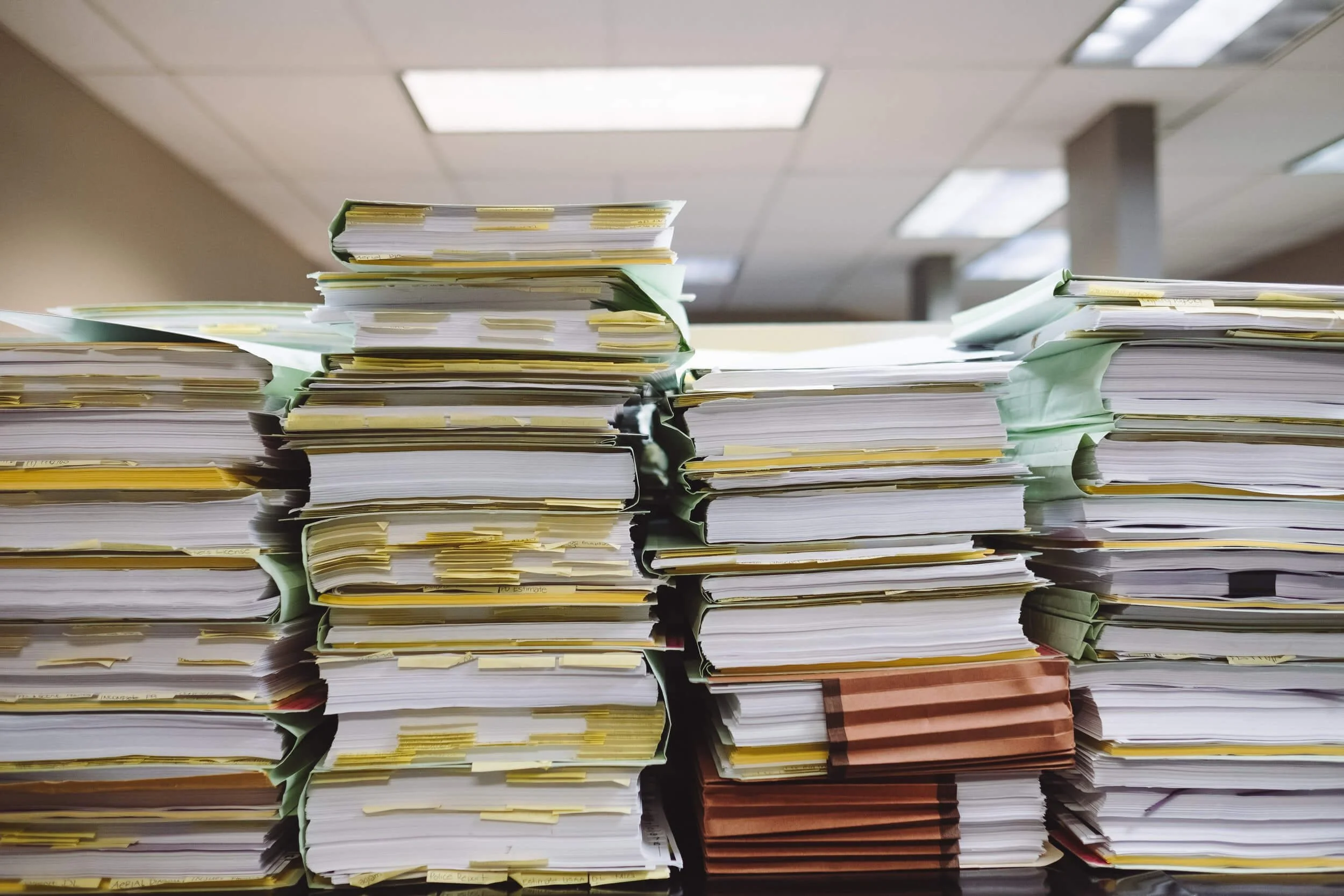 stack of paperwork and books