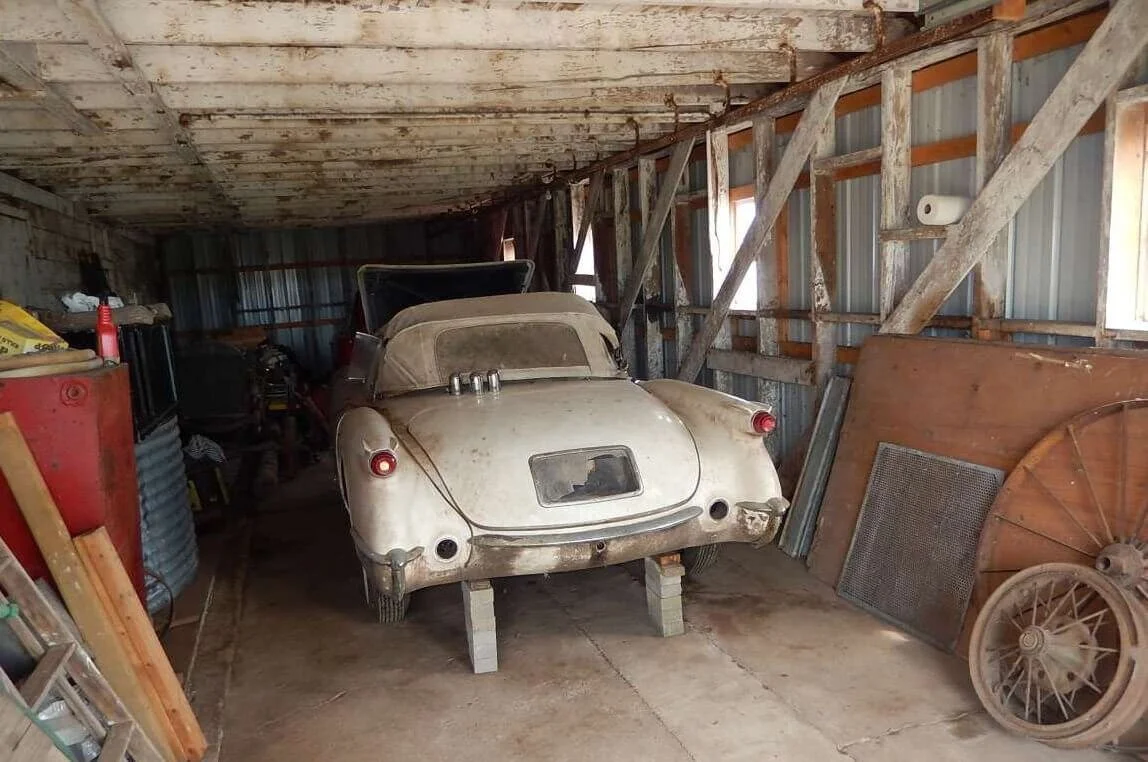 old car in barn