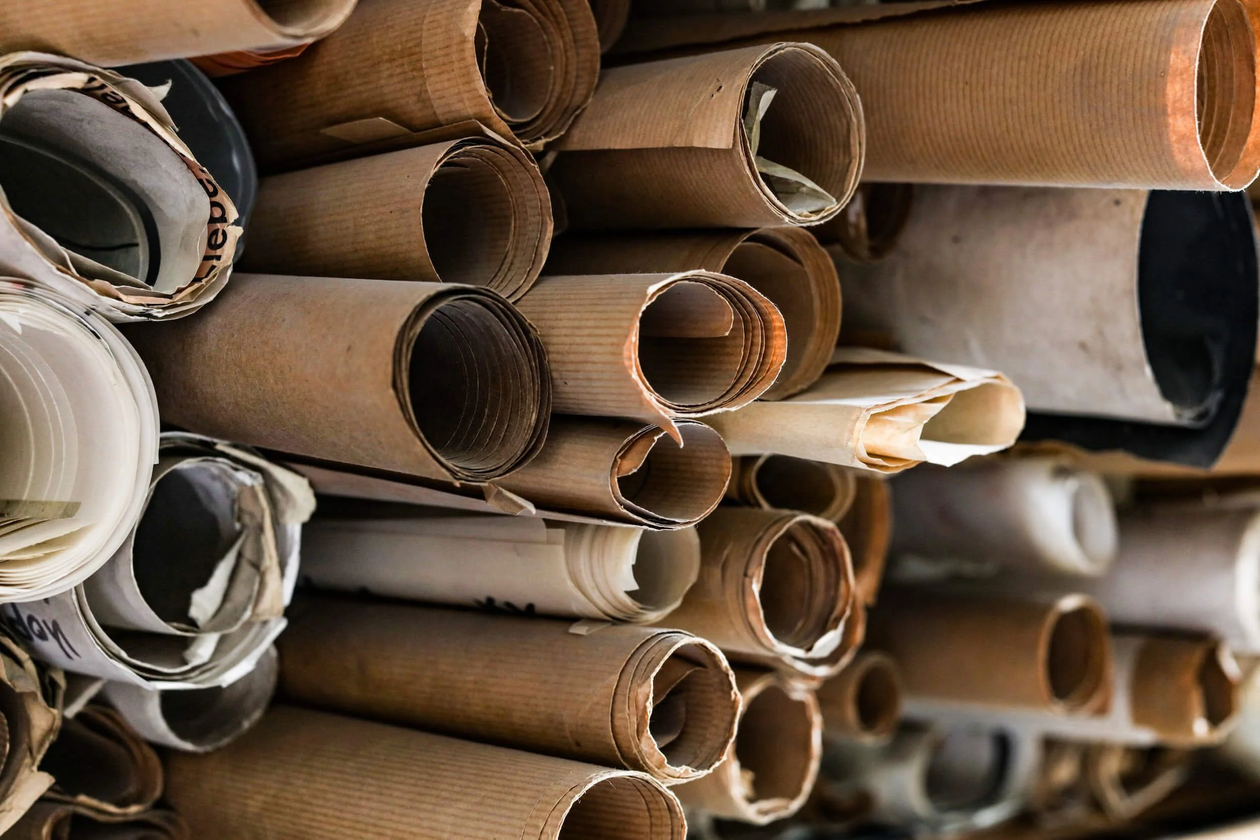 pile of rolled paperwork